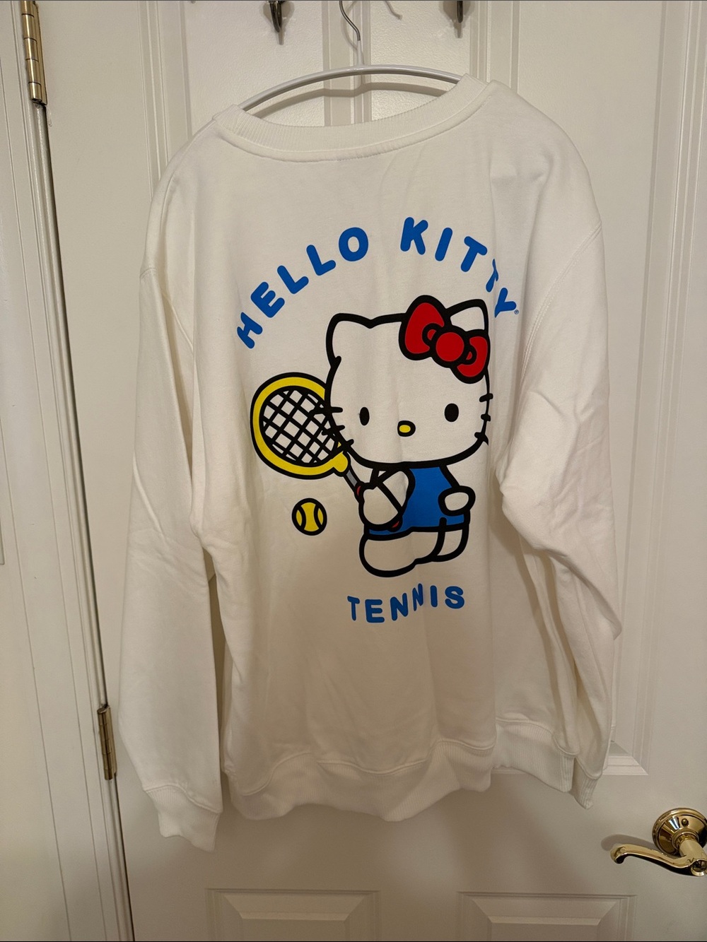 Hello Kitty White Sweatshirt with Tennis Graphic in Yellow & Red